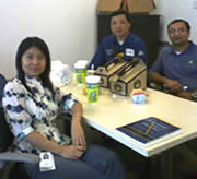 Asian engineers from a large Texas refinery  enjoy a break from their Speaking English Clearly  course with Sandra Zimmer